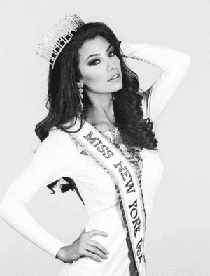 messer-candace-e1509027083117 Woman wearing a crown and Miss New York USA sash showcasing her smile from dental work